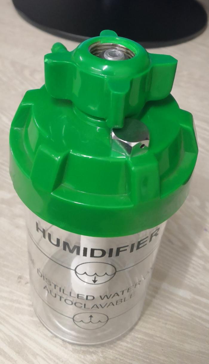 Green cap humidifier bottle with safety valve 